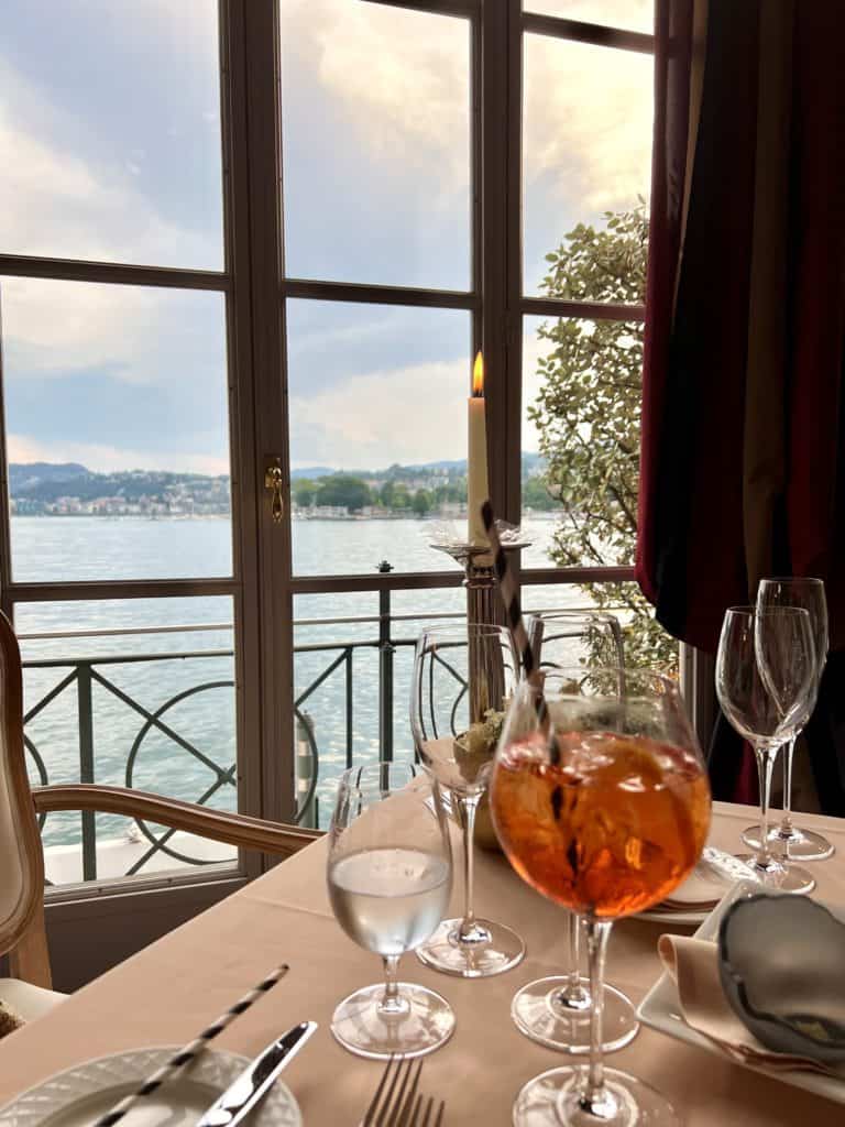 Breathtaking sunset view of Lake Lugano from the dining room of Michelin-starred Galleria Arté al Lago.