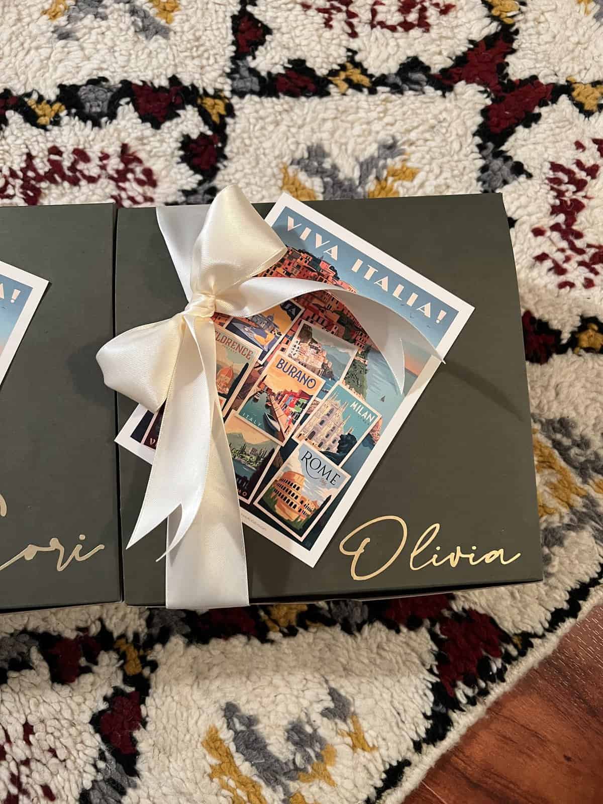 A personalized sage green bridesmaid proposal box with a minimal white ribbon, showcasing a practical and intentional gift aesthetic.