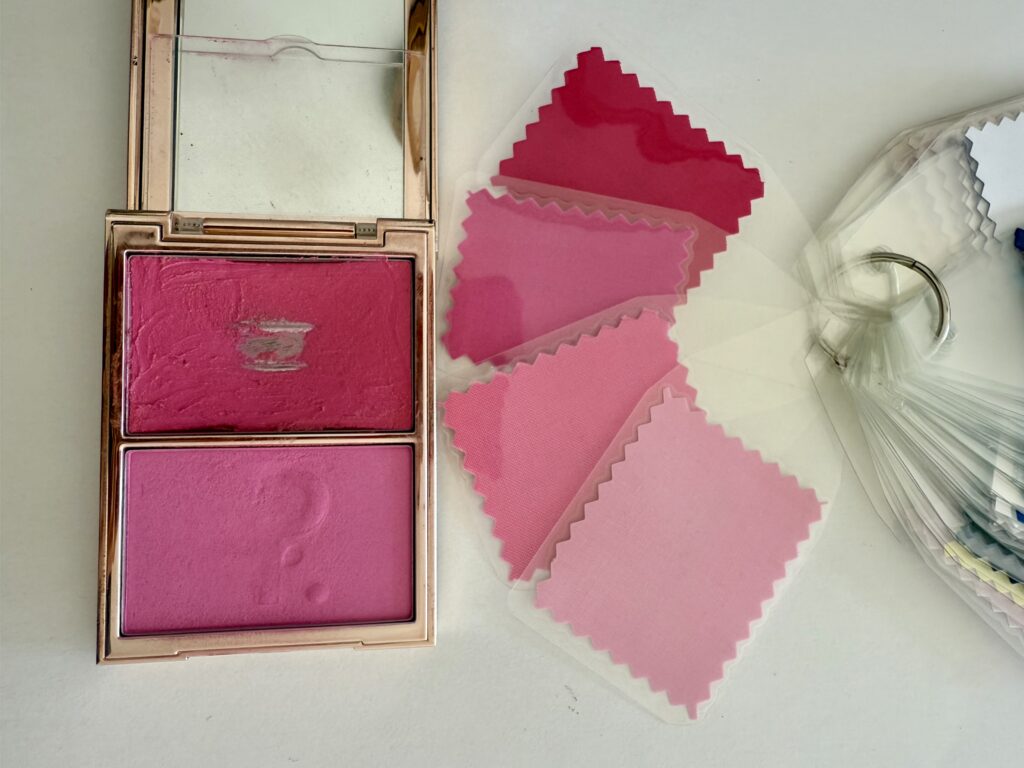Patrick Ta Double-Take Blush in cool-toned shade She's Giving Next to a True Winter color palette.