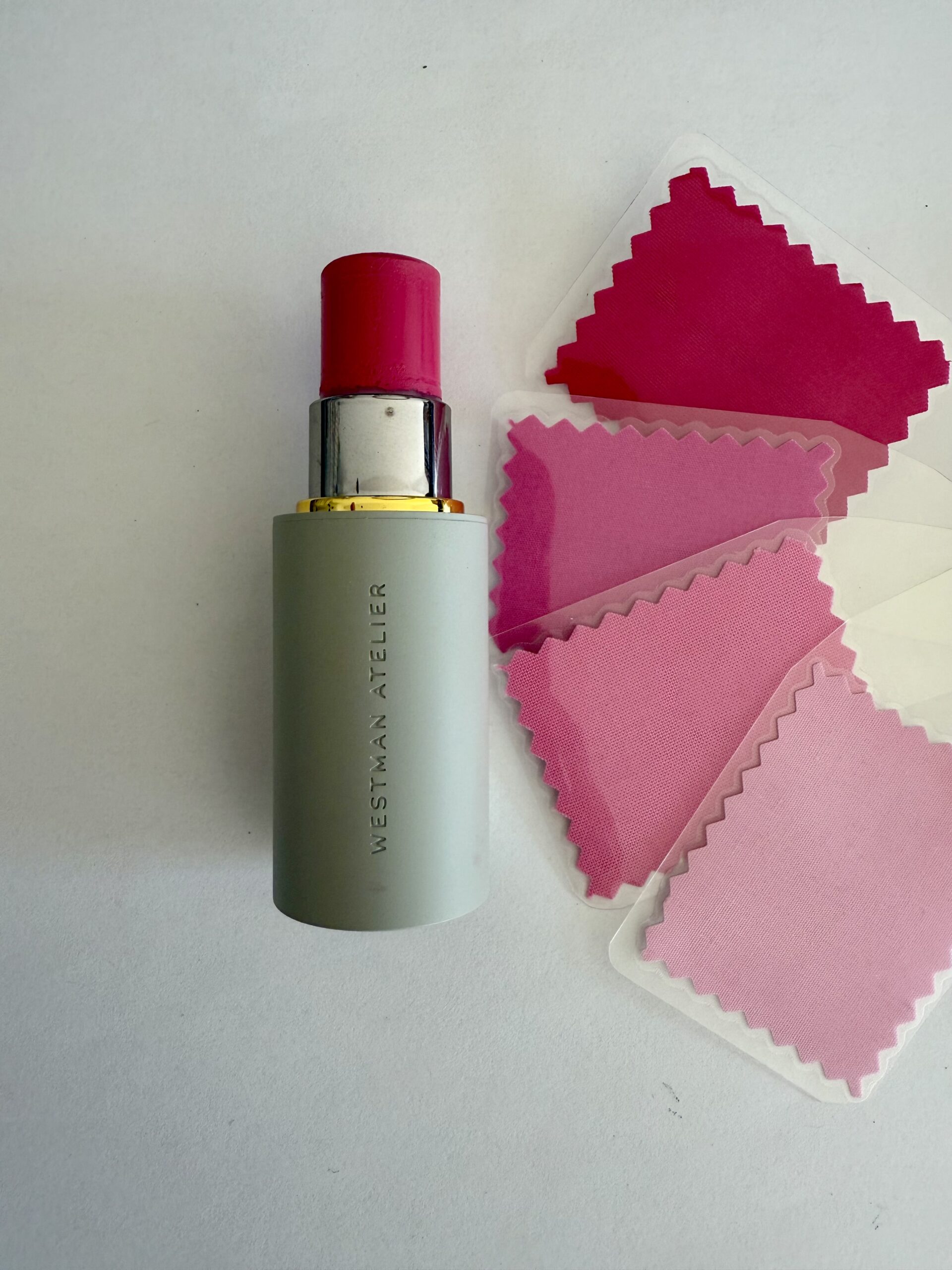 Westman Atelier Baby Cheeks blush stick in bright cool pink shade Poppet compared to True Winter color swatches.