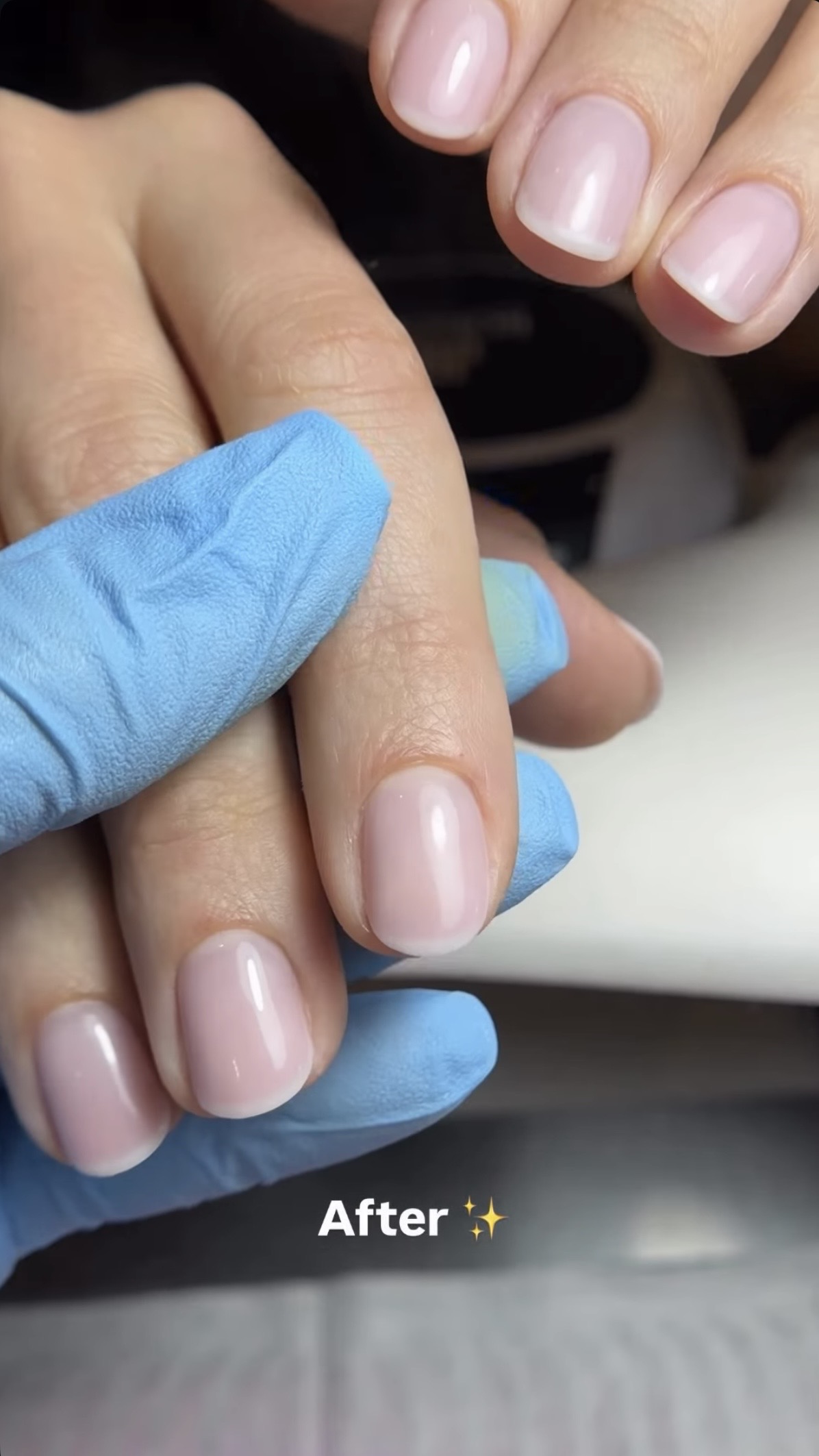 Detailed view of a hidden French tip manicure, showcasing the precision and longevity of the Russian technique.