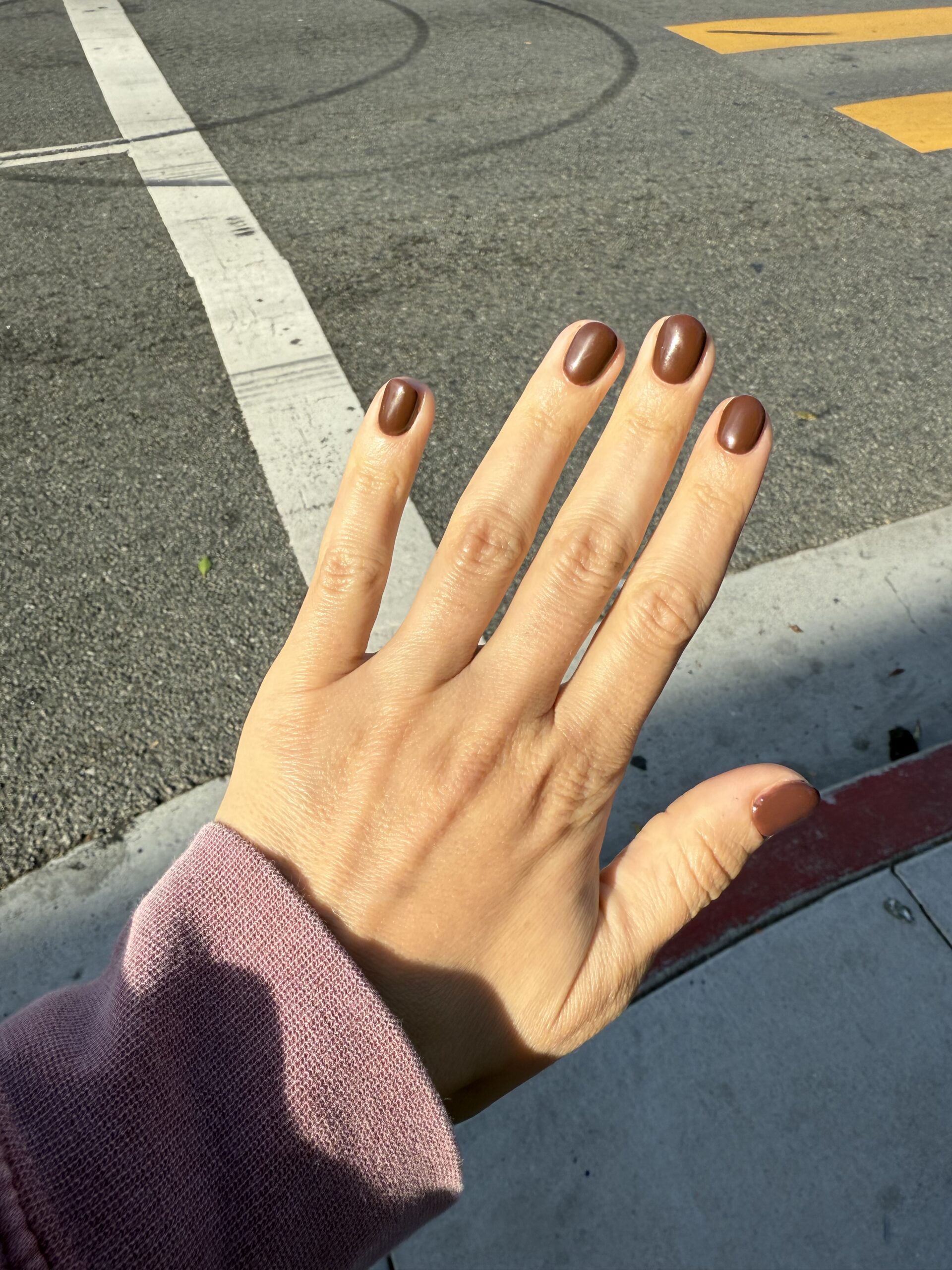 Close up of hands after two years of using Soft Services Theraplush retinol hand treatment showing improved skin texture.