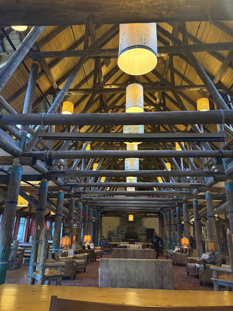 Historic timber-frame lobby and Great Hall fireplace inside Paradise Inn at Mount Rainier National Park.